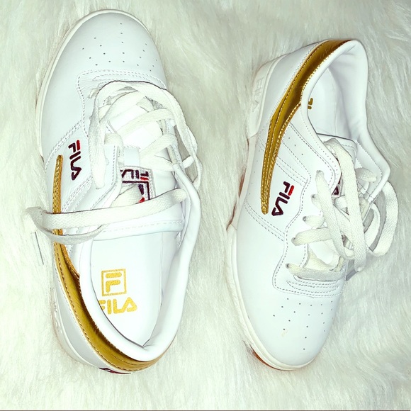 gold and white filas